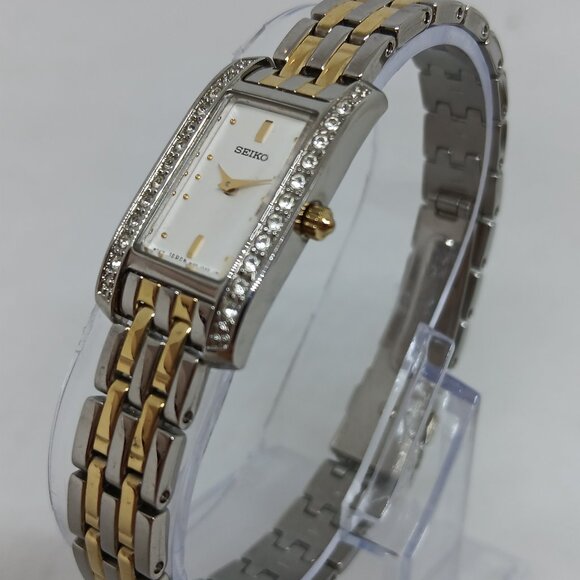 Seiko 1N00-0SK0 Women's 16mm x 28mm White Dial Two Tone Crystal Watch NEW BATT - Picture 1 of 11